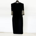 Mid length dress with five quarter sleeves